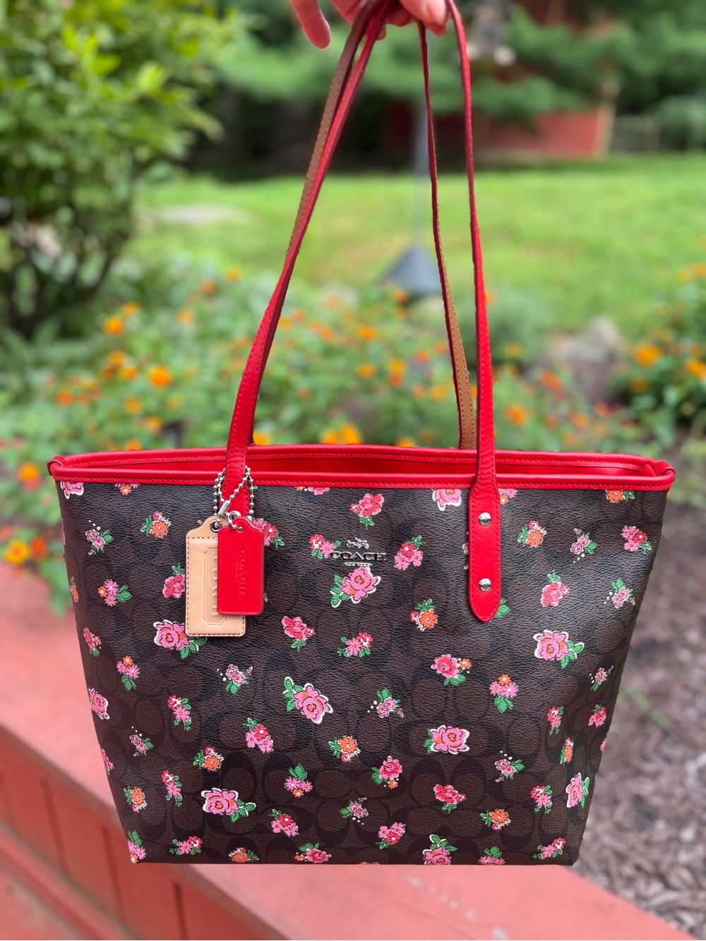 Coach Black Floral Leather Carryall Tote with Red Trim Contrasting Handles